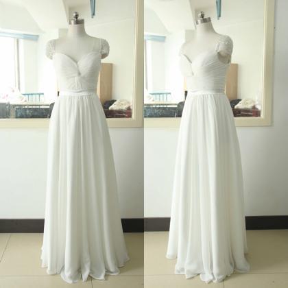 White Floor Length Chiffon Prom Dresses Featuring..